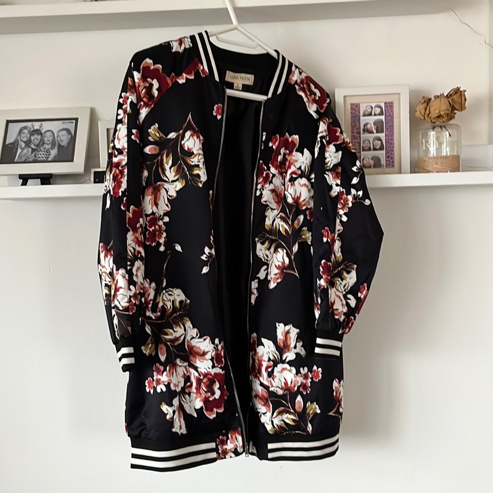 Sports-style satin-feel jacket with floral pattern and elastic striped details